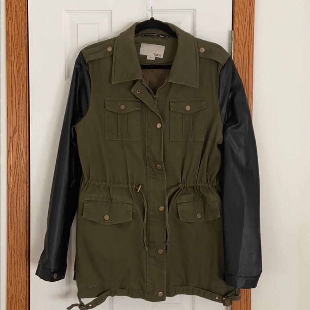 Green utility jacket with faux leather sleeves